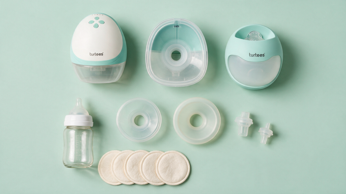 Turtees T10, T20 and T30 with flanges, valves, bottle and nursing pads laid out, breast pump glossary