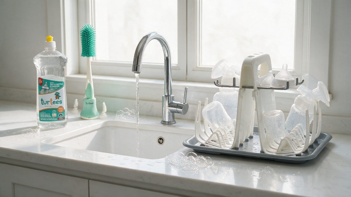 Turtees bottle and toy cleanser, silicone bottle brush and drying rack with clean bottles by the sink