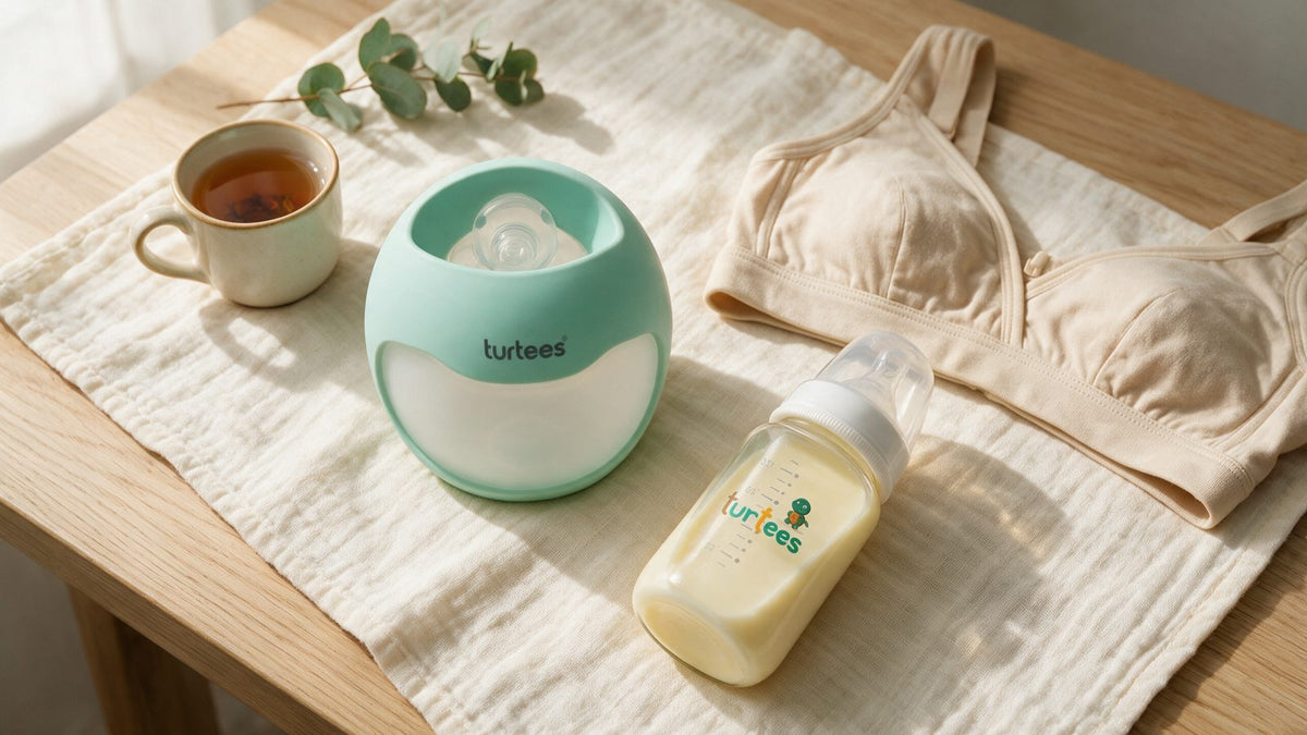 Turtees T30 in-bra milk saver beside a Turtees glass bottle of breast milk and a nursing bra